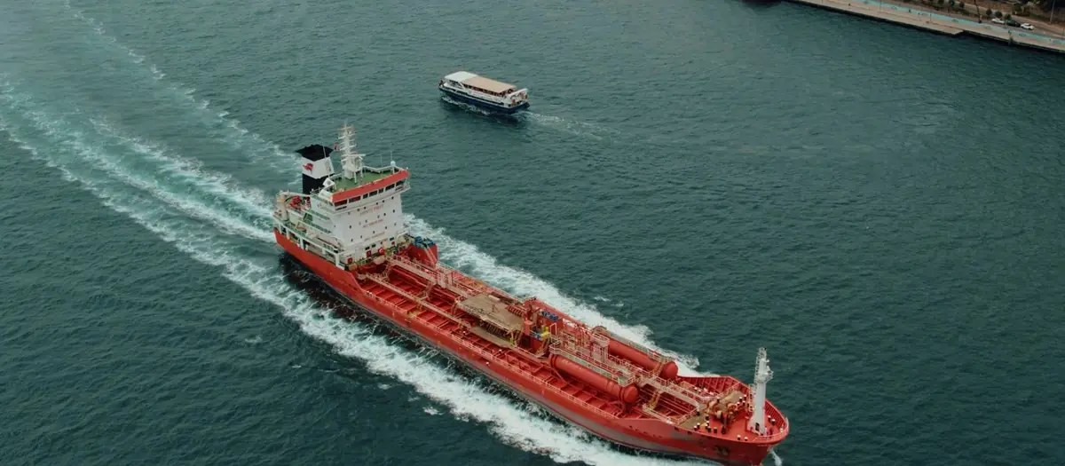 Product tanker under way, leaving a wake